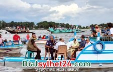 হাওরে শতশত নৌকা নিয়ে সাবেক রাষ্ট্রপতিকে বরণ